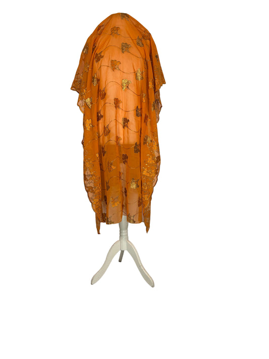 somali Garbasaar deer head with antlers on a white cloth, wooden floor visible