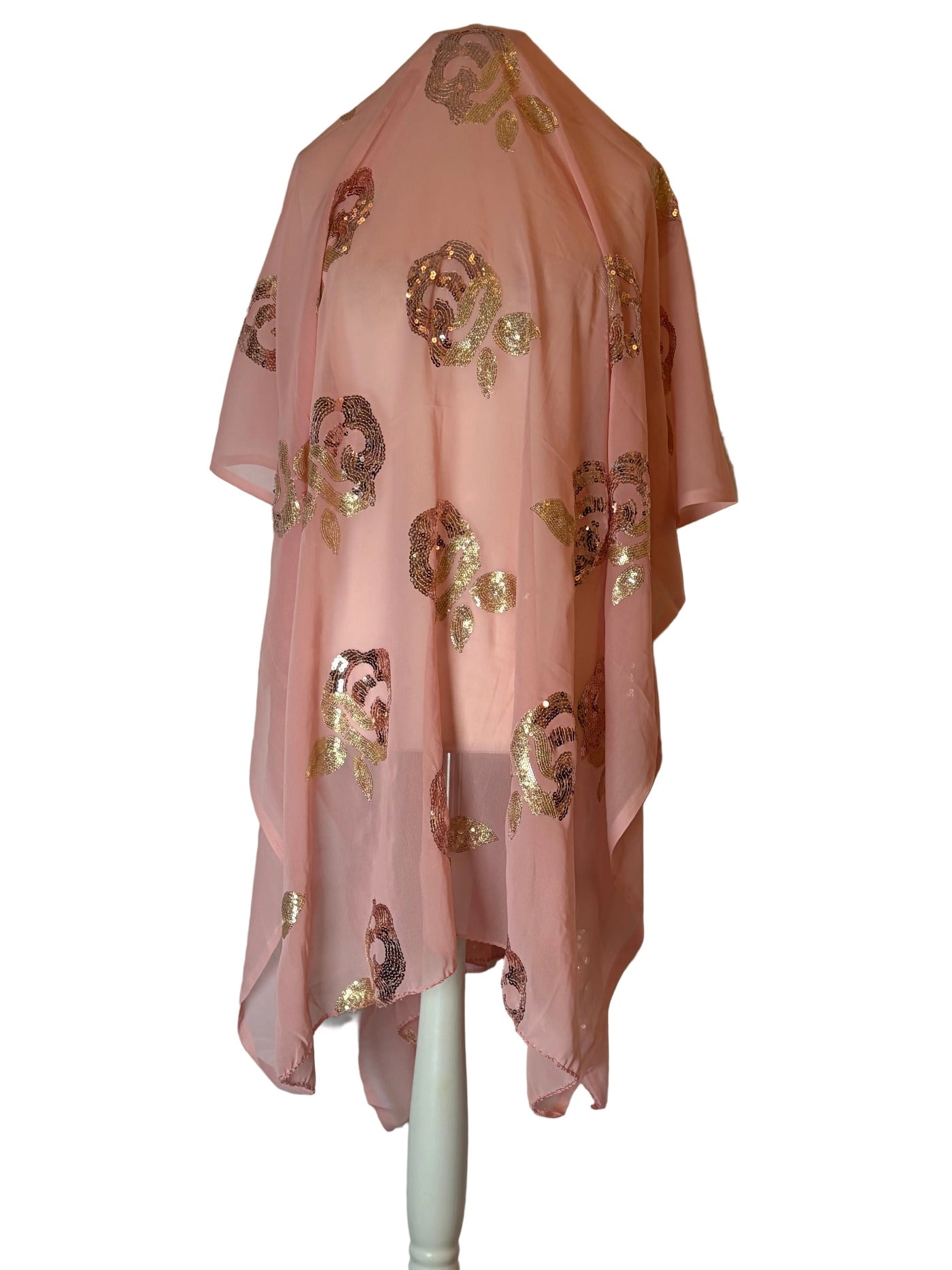 Orange Garbasaar floral embroidered garment on a white background