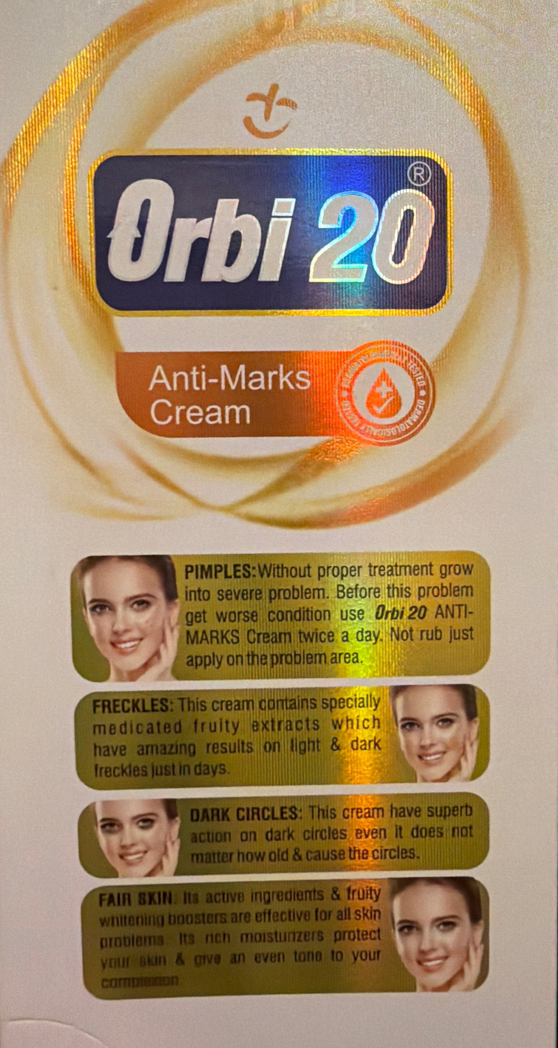 Orbi 20 Anti-Marks Cream packaging with images of faces on a colorful background