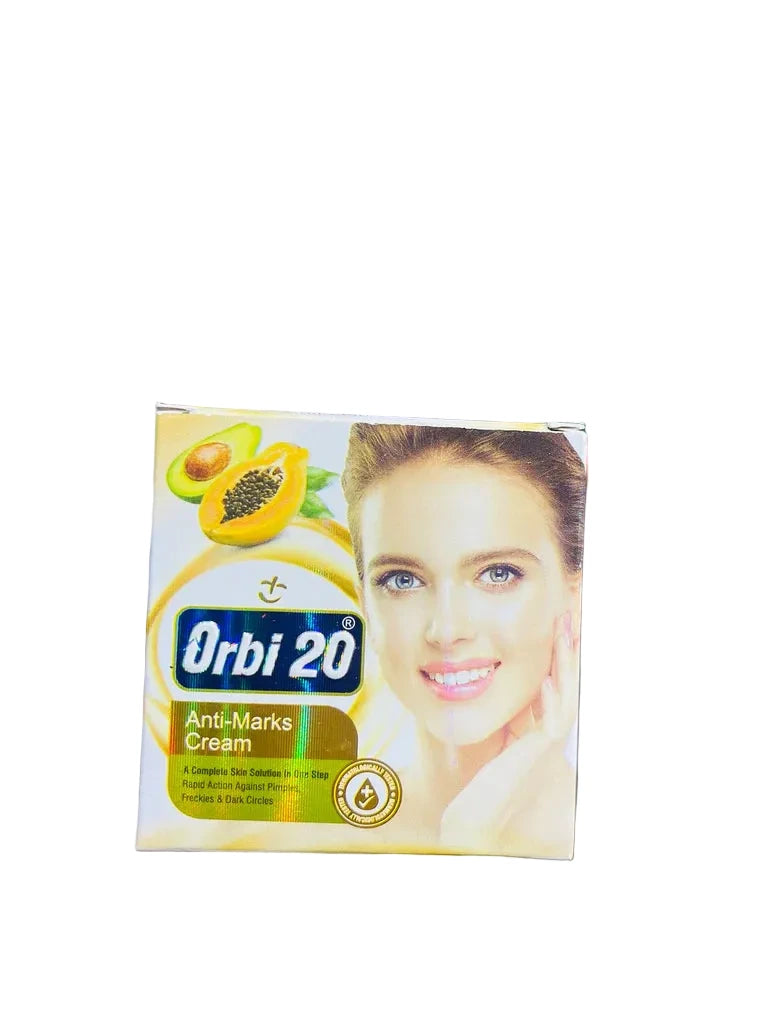 Orbi 20 Anti-Marks Cream packaging held by a person in a store setting