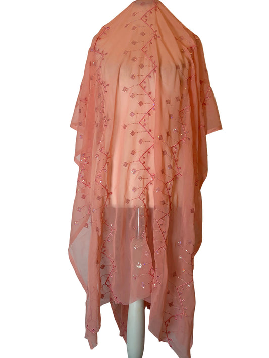 Peach Garbasaar embroidered fabric on a white background