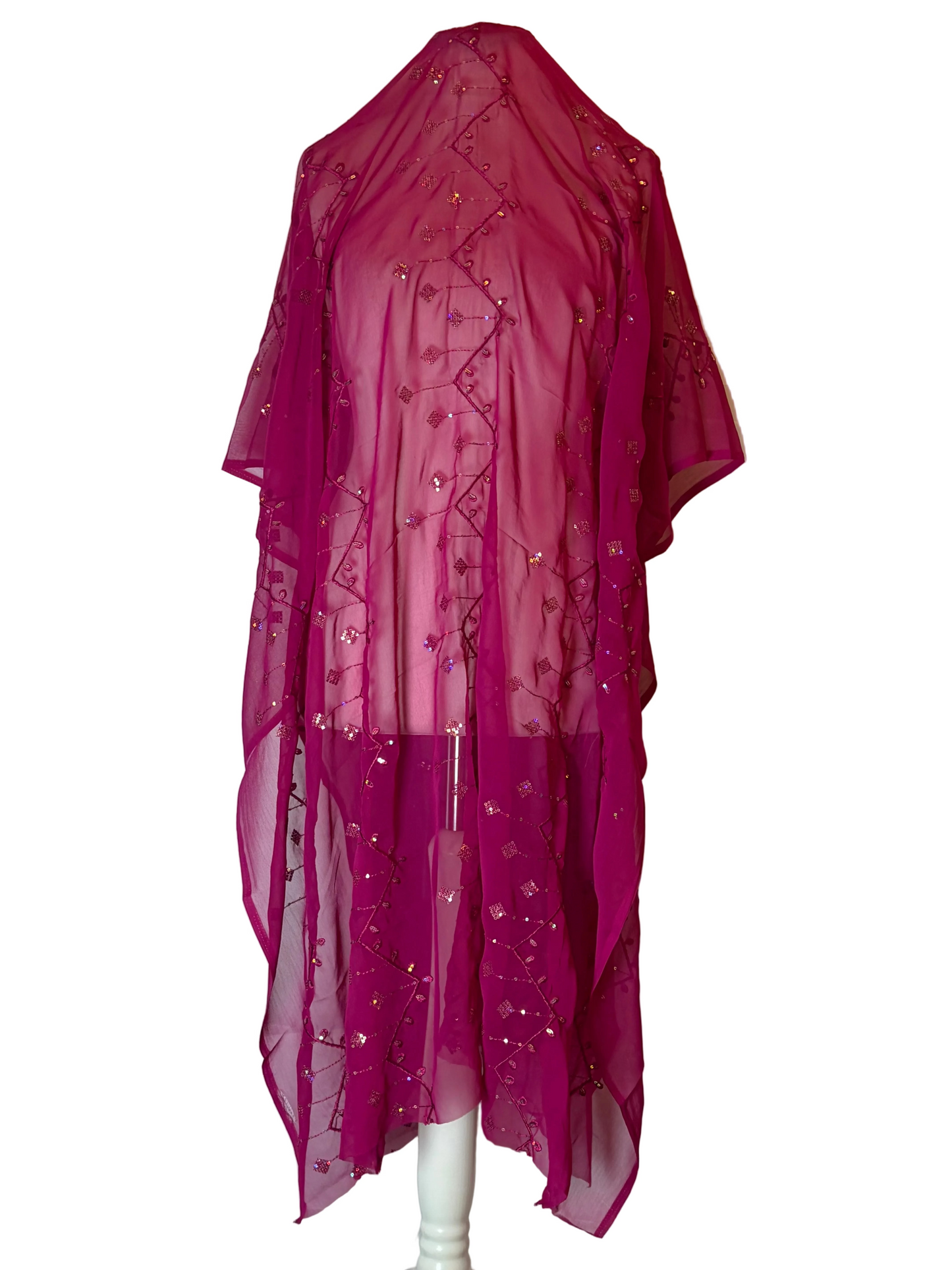 Fuschia Garbasaar garment with floral embroidery on a white background