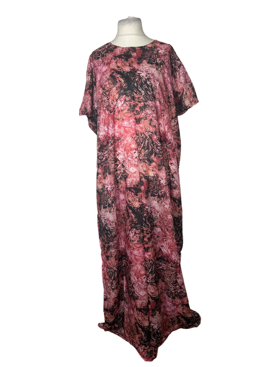 Pink and black patterned Somali Baati on a mannequin against a white background