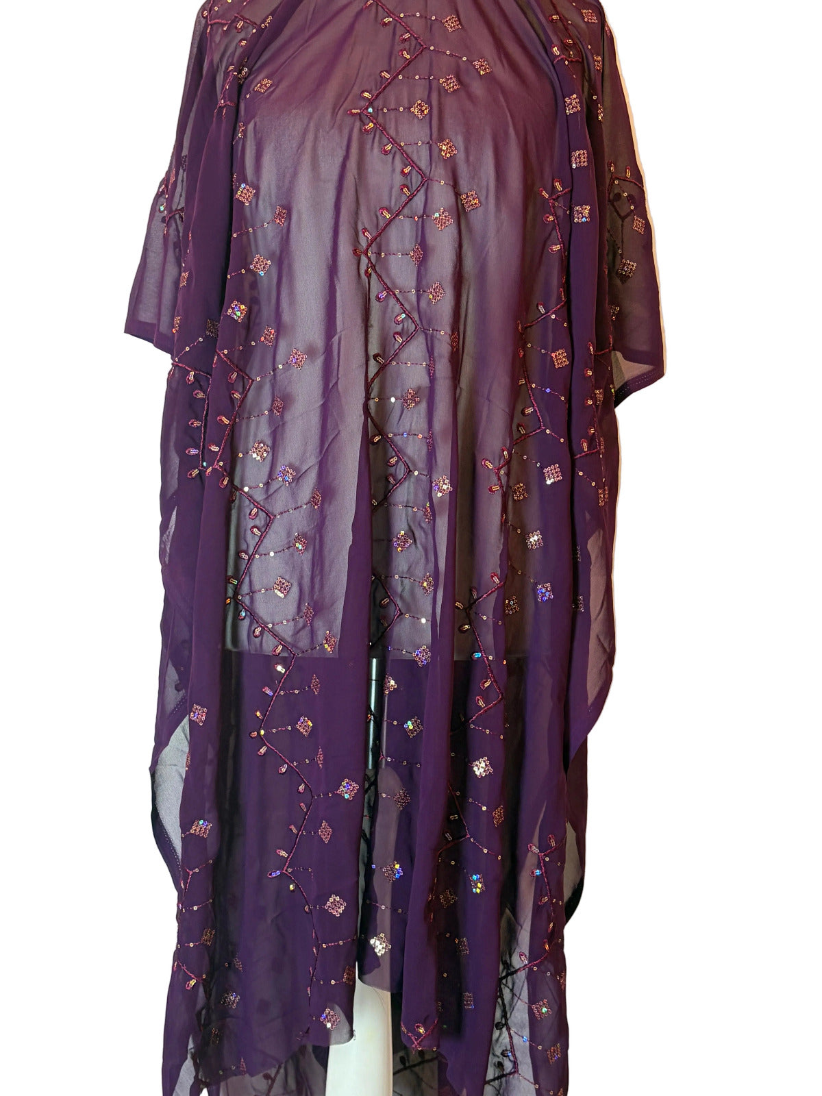Purple Garbasaar fabric with floral embroidery on a white background