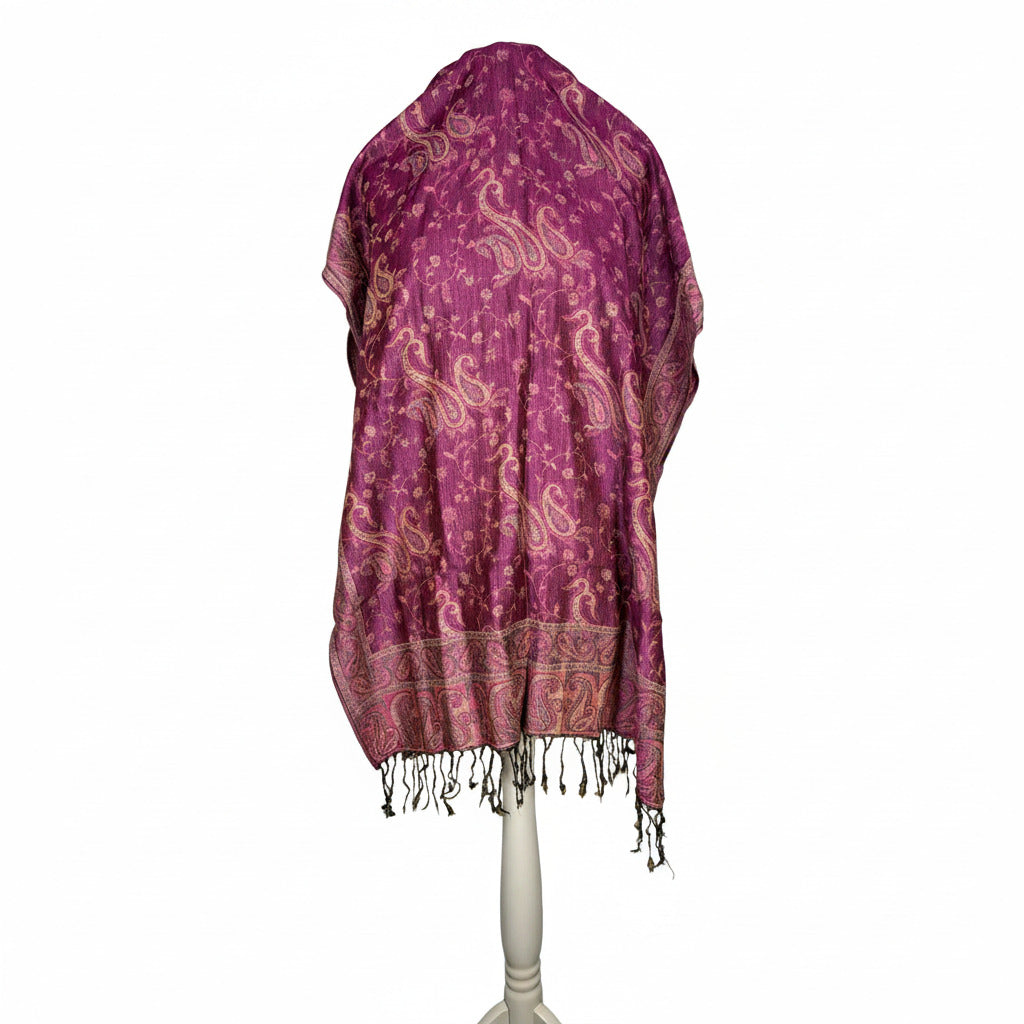 Purple patterned scarf on a white stand against a white background