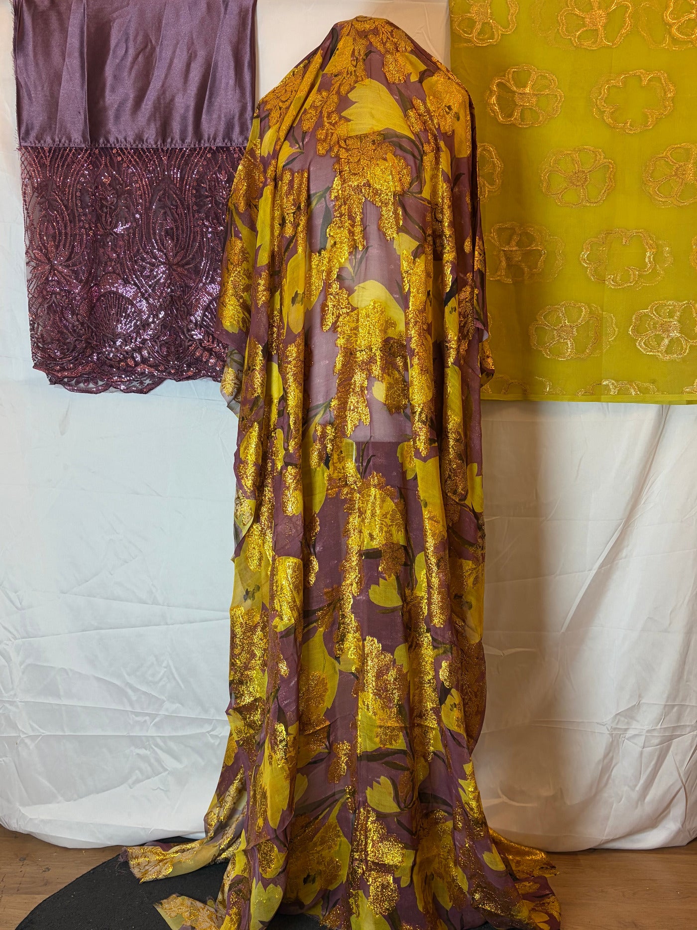 Somali Dirac full set with gold and purple pattern on a white background