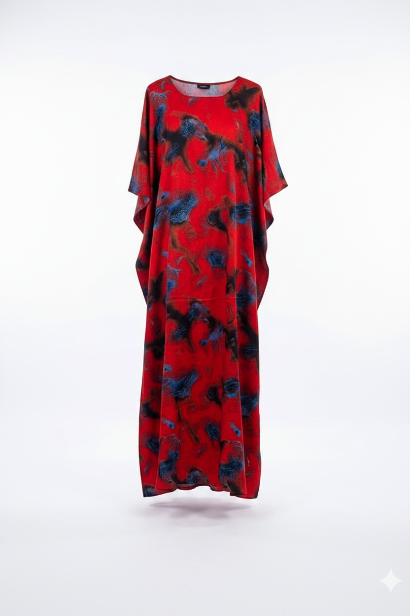 Somali Red Baati dress with blue floral pattern on a white background
