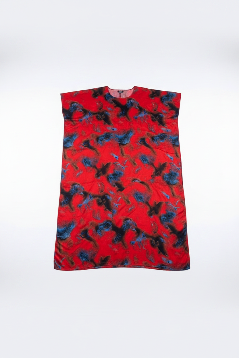 Red dress with black and blue floral pattern on a white background
