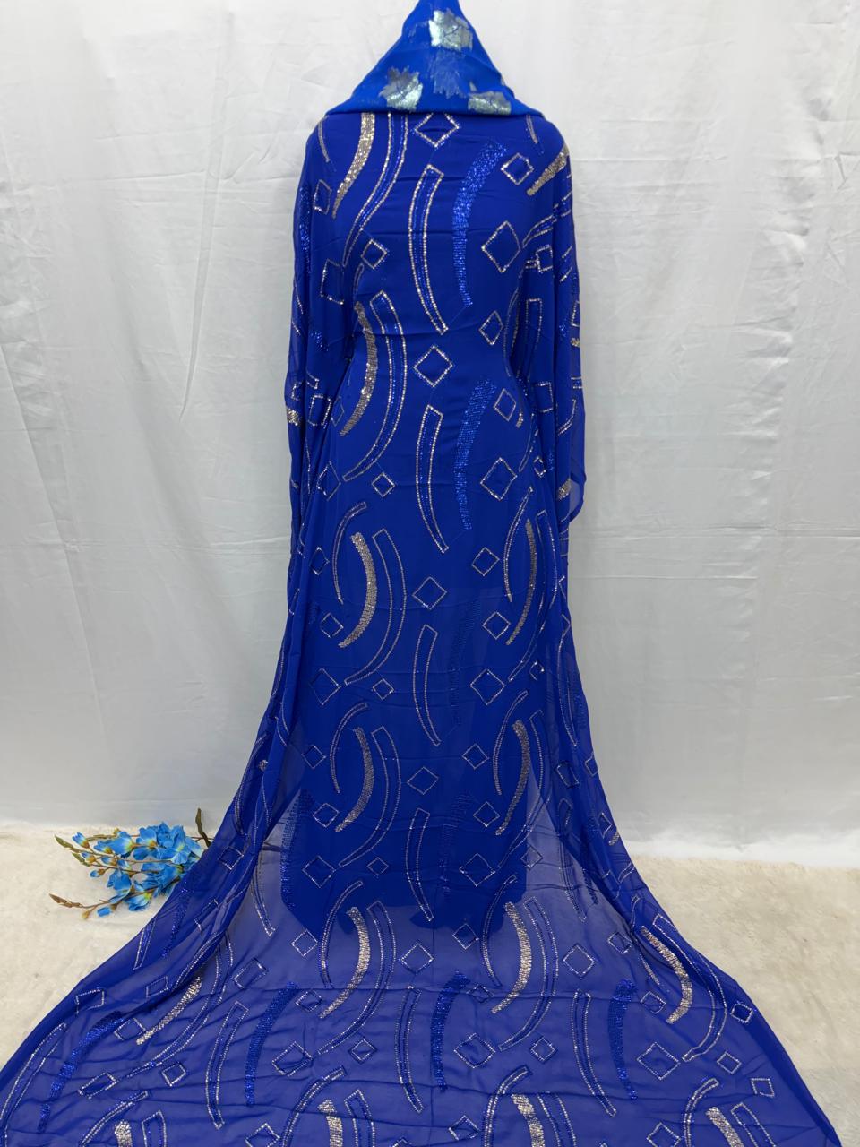 Blue Maysa Dirac fabric with geometric patterns on a white background