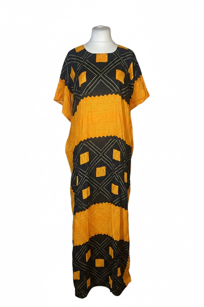 A short-sleeved kaftan dress displayed on a mannequin torso against a plain white background. The dress features a bold horizontal striped pattern of black and mustard yellow, with geometric diamond and lattice-like printed details.