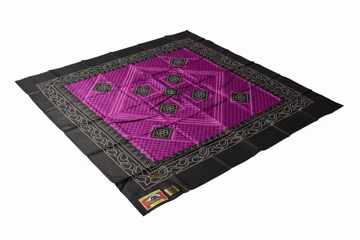 Somali shaash Purple and black patterned fabric with a visible brand label on a beige surface
