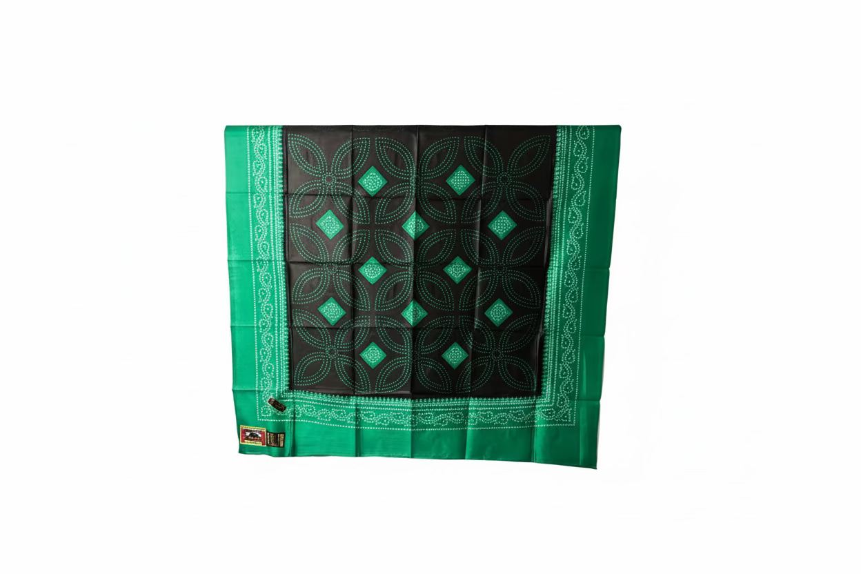 Green and black patterned somali shaash fabric with a visible brand label on a white background 