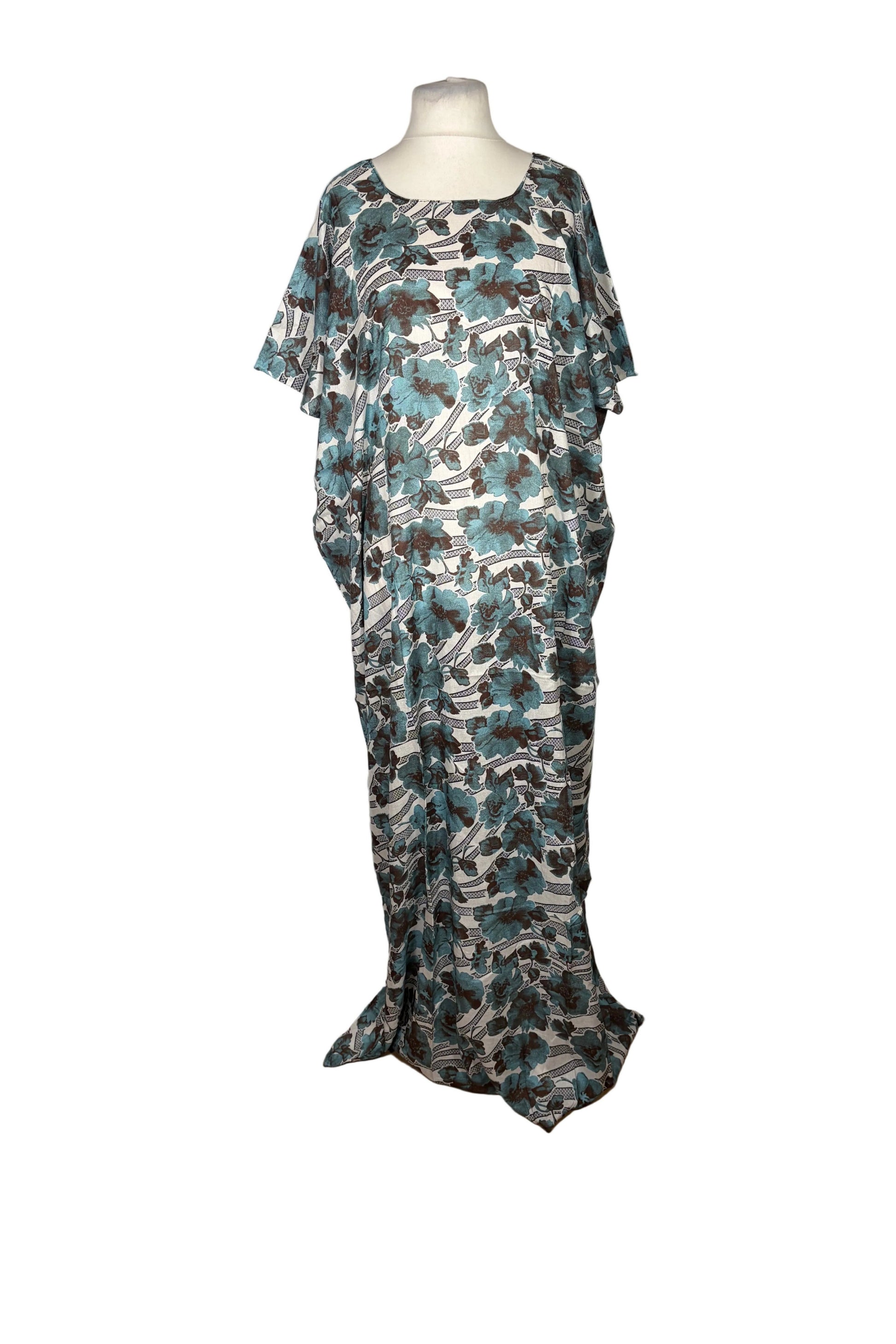 Camouflage-patterned Somali Baati dress on a mannequin against a white backdrop