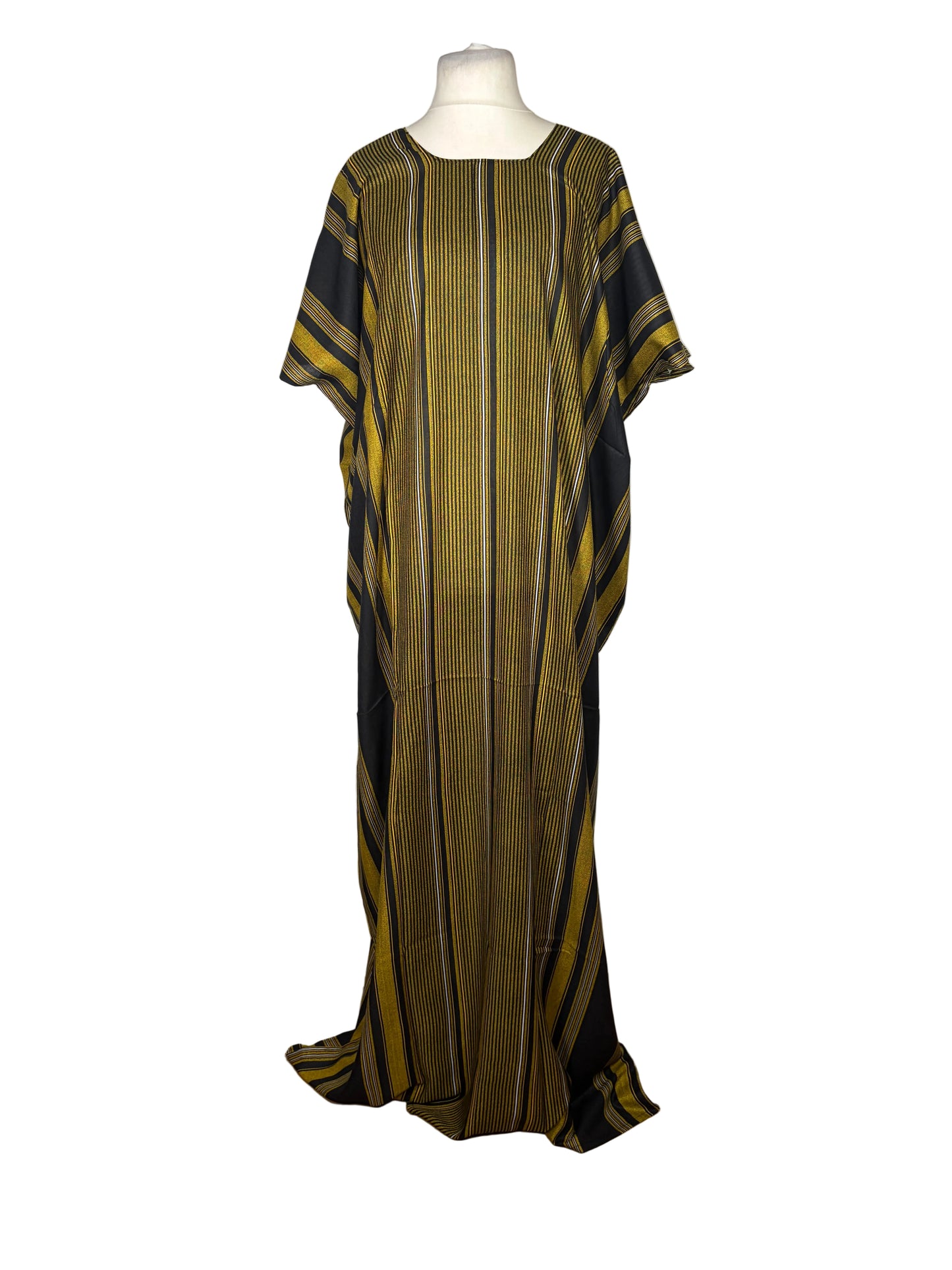 Green and black striped dress on a mannequin against a white backdrop