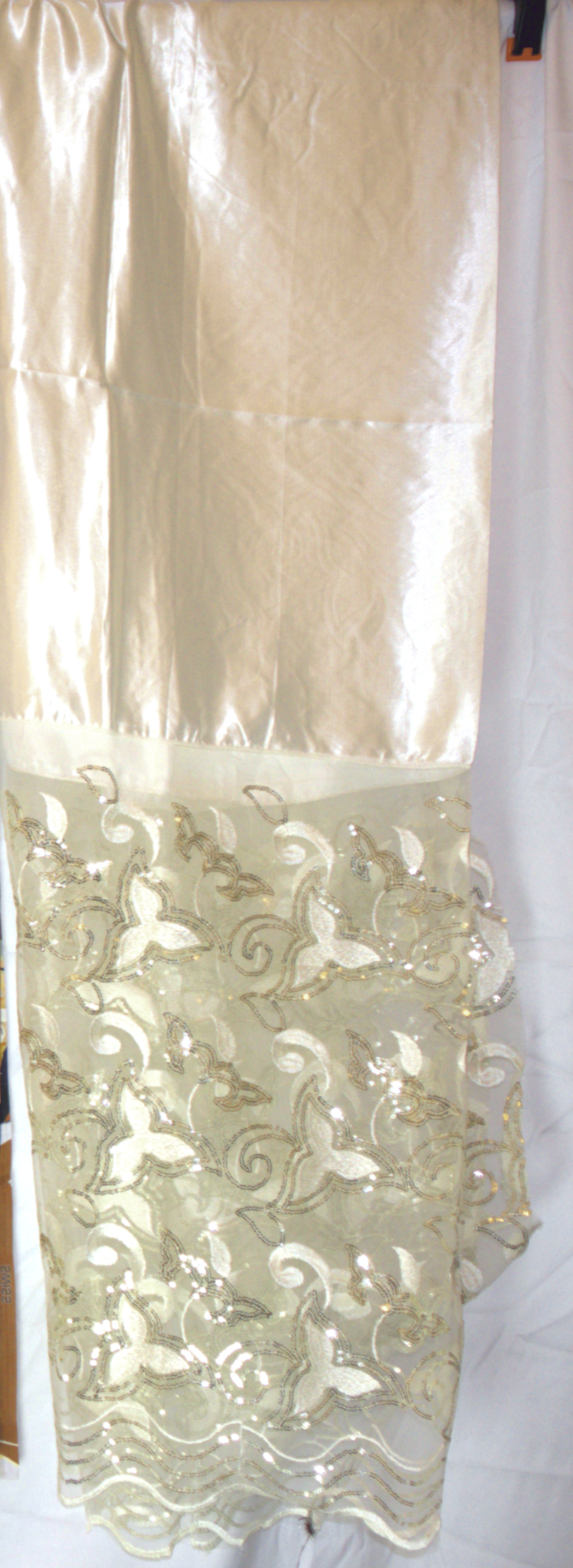 White Gorgorad fabric with intricate patterns on a white background