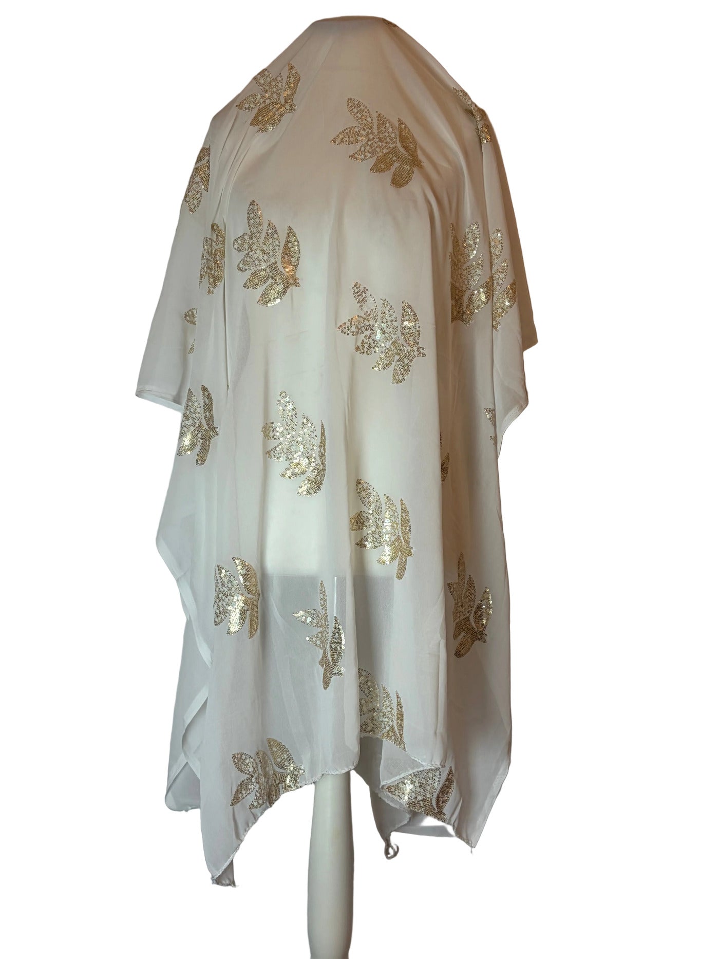 White Somali Garbasaar fabric with gold floral embroidery on a white background