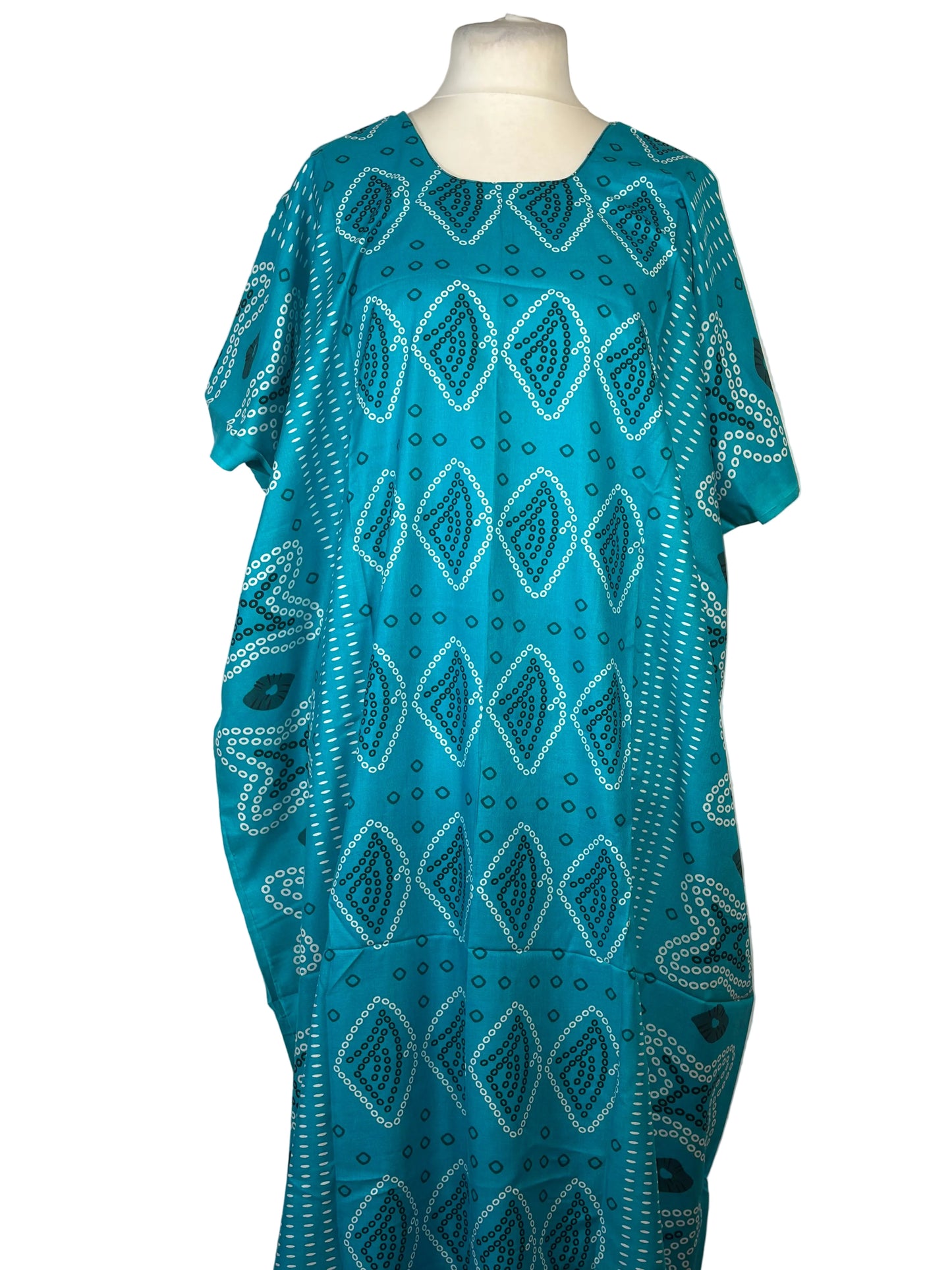 Blue patterned Somali baati on a mannequin against a white background