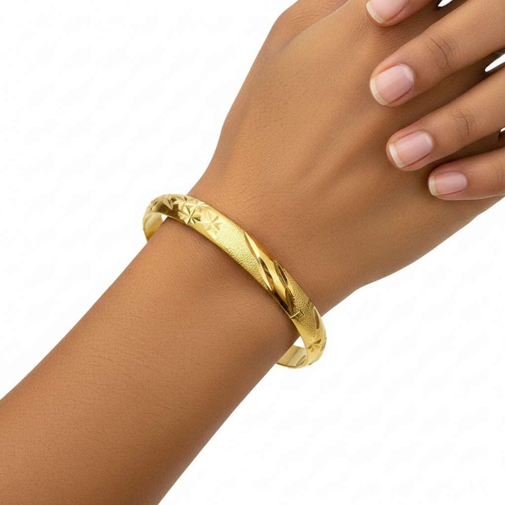 Gold Plated Star-Cut Bangle on Somali Model Hand