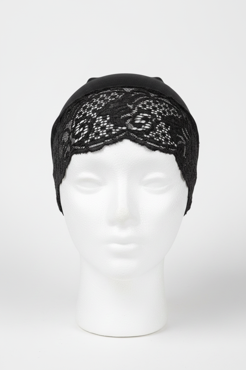 A black lace headband with a scalloped pattern, displayed on a white mannequin head against a light gray background.