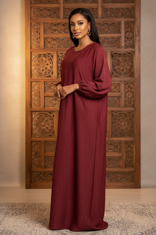 Somali model wearing Warm Traditional Jalabiya Dress - alternate angle