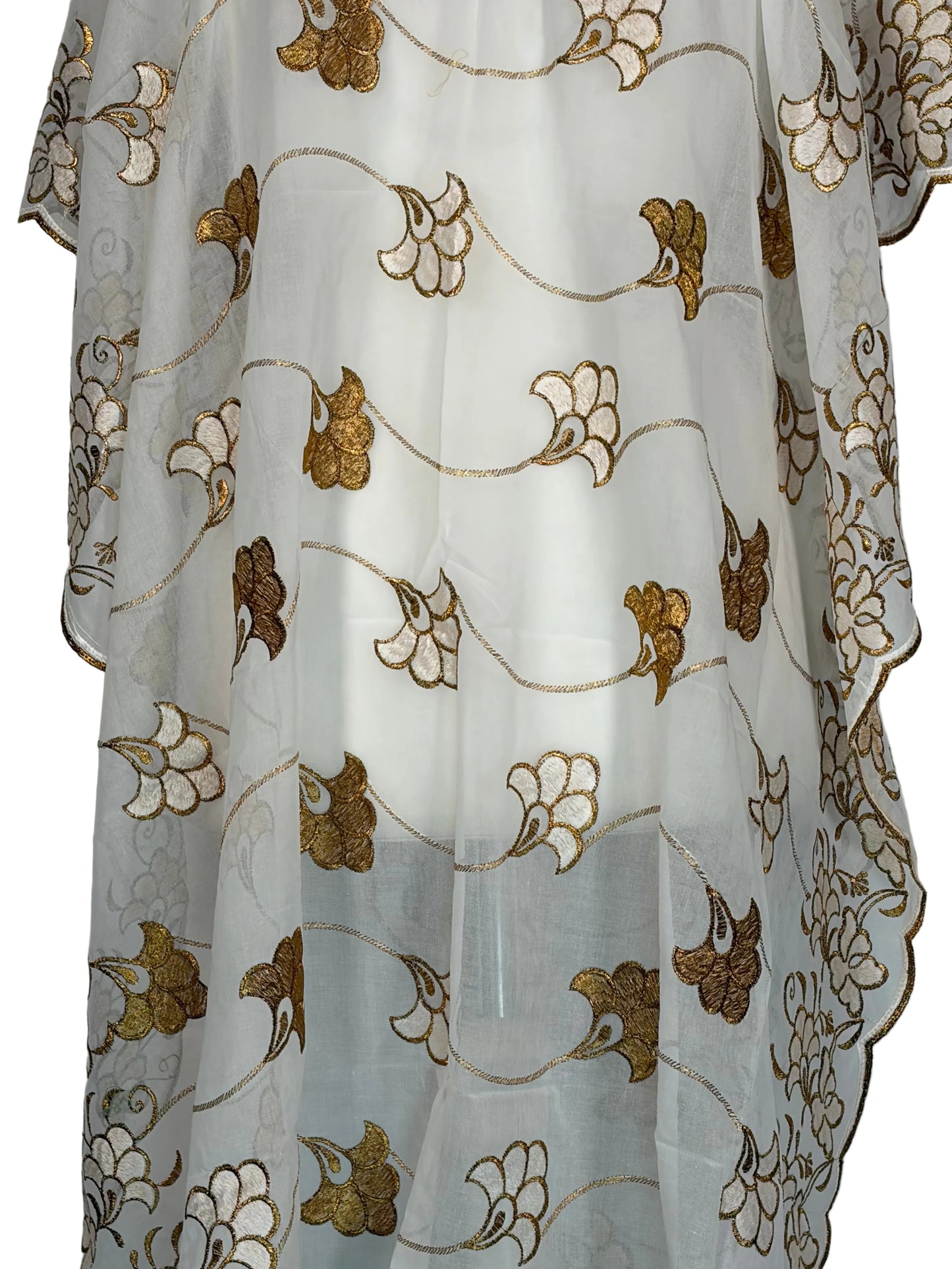 white floral-patterned fabric with gold and brown designs on a white background
