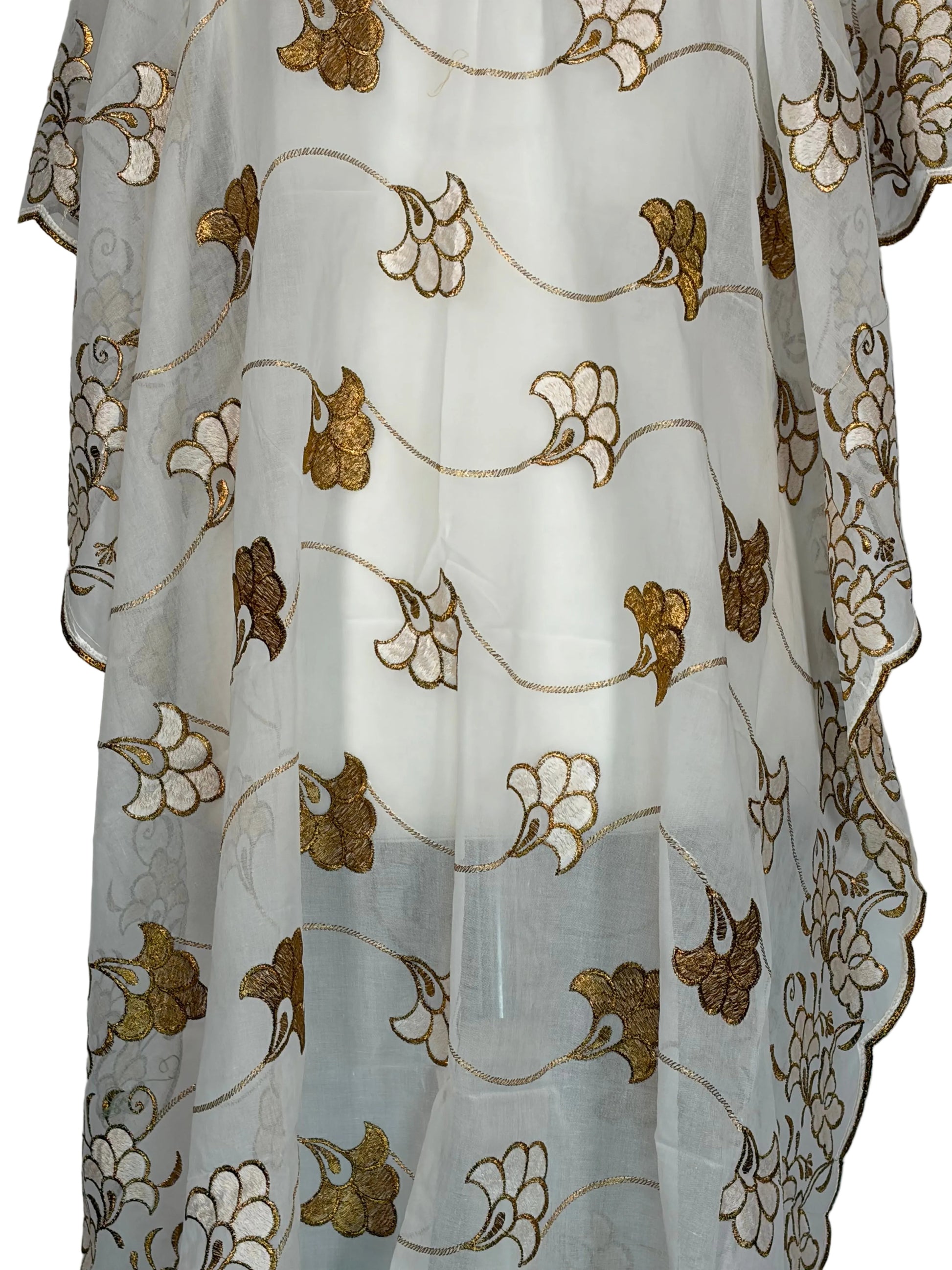 white floral-patterned fabric with gold and brown designs on a white background